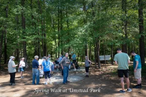 people gathering for the spring walk at Umstead park